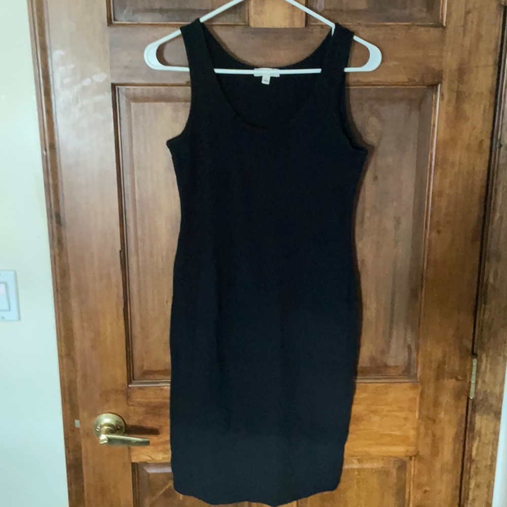 Size L- black, fitted dress.